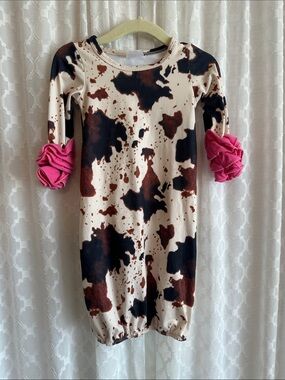 #906 Cow-Print Kids One-Piece Bodysuit with Pink Ruffle Sleeves